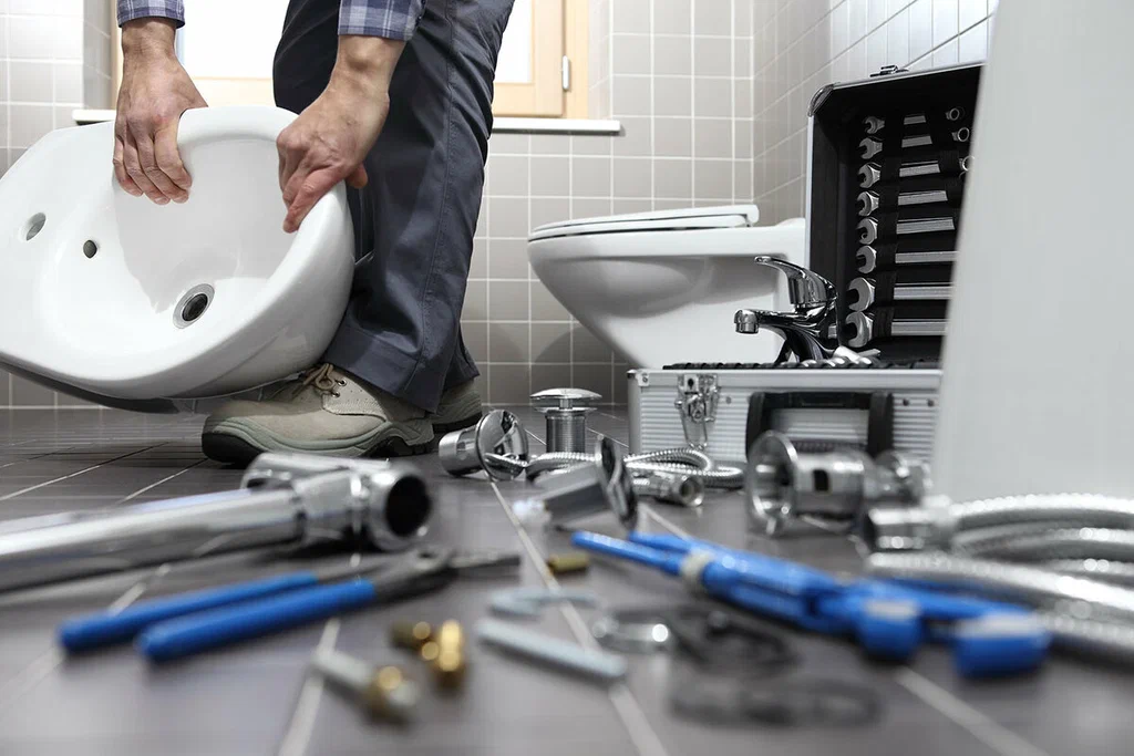 Plumbing tools prepared for a bathroom repair in Holly Springs